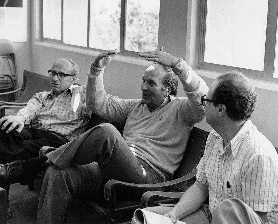 Walter Kohn, J. Robert Schrieffer and Pierre Hohenberg conversing, 1982