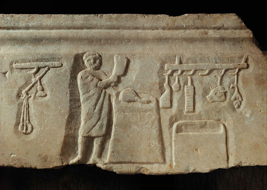 bas-relief romain figurant un boucher dans son échoppe