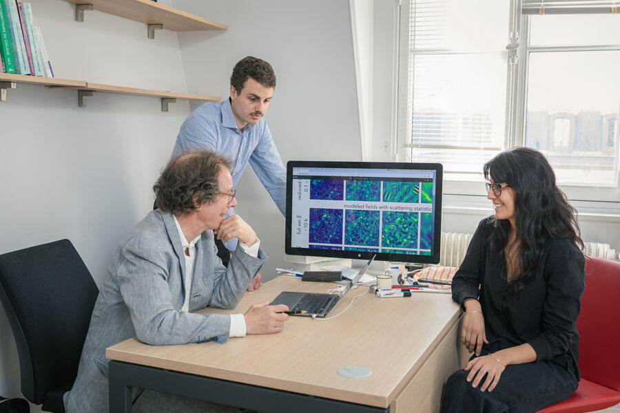 ©Frédérique Plas / CNRS Images Stéphane Mallat et deux membres de son équipe