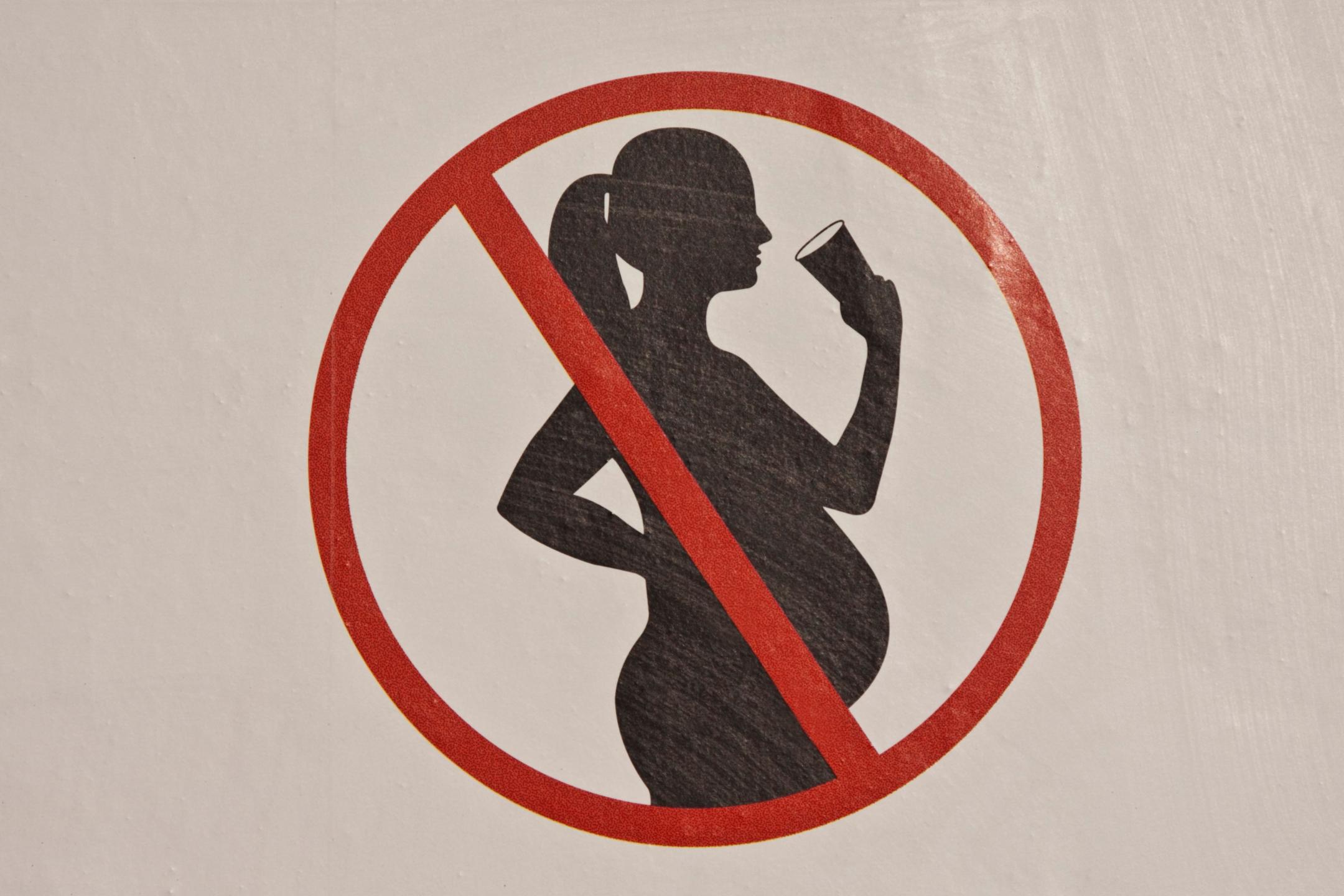 Pictogramme montrant l'interdiction de boire de l'alcool durant la grossesse.