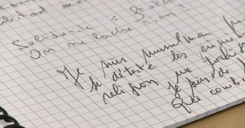 Condoléances écrites à la main sur un cahier
