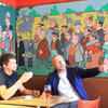 ©Ludovic Maisant / Hemis.fr Deux hommes dans un café, une fresque dessinée en arrière-plan - France, Haute-Vienne (87), Limoges, rue Gondinet, Le Swing Café
